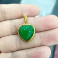 Gold-plated stainless steel heart pendant with green jade stone held in hand - Heart / Pendant Only (No Chain)