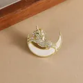 Detail of elegant gold unicorn brooch with white crystals and crescent moon inlay - Rhinestone Moon Pony (XZ09-008 Moon Pony)