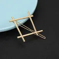 Detailed close-up of a minimalist gold geometric metal hair clip for women's styling - Irregular Square Frame Style