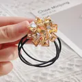 Elastico per capelli con fiori di cristallo ambrato stile coreano su sfondo di pizzo - Cristallo Champagne