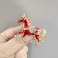 Handheld red enamel horse brooch with gold finish and sparkling white crystals - XZ Red Horse