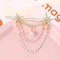 Elegante clip de pelo de hexagrama dorado con brillantes y borlas de perlas - Estilo de Estrella