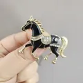 Running horse brooch in black enamel and gold alloy with white rhinestone details - XZ Black Horse