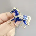 Running horse brooch in blue enamel and gold finish with white crystal accents - XZ Blue Horse