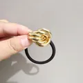 Elegante elastico per capelli nero con ciondolo in metallo dorato intrecciato - Geometria Avvolgente (PJ027-005 Oro Irregolare) / Oro