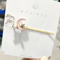 Haarklammer in Gold mit weißem Hasen, rosa Mond, Strass-Stern und Kunstperle - Hase Mond Rosa