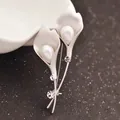 Elegant Calla Lily brooch set with matte white petals and white teardrop pearl accents - Silver Calla Lily