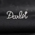 Close-up of Darlie letter brooch with pavé rhinestones and teardrop crystal detail - Silver Darling Style