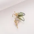 Elegante bosfee-broche van goudlegering met groene vleugels en witte strasstenen - Groen Engel Meisje