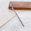 Minimalist silver bamboo joint hair stick with leaf detail on an artistic background - Black