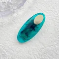Detalle de pinza para el pelo ovalada de resina verde azulado con textura de mármol - Óvalo Azul