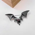 Gothic bat wing brooch with black enamel and red rhinestone eyes for Halloween suit - Black Bat Style