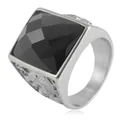 Macro shot of faceted black gemstone and intricate relief texture on steel ring - Size 8 / Steel Black Stone