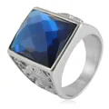 Detailed view of the square blue gemstone and brushed silver steel dragon ring - Size 8 / Steel Color Blue Stone