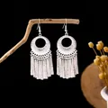 Silver bohemian tassel drop earrings with vintage ethnic hollow circular design - Hammered Round Tassel Style (E3037-6.) / Silver