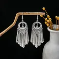 Ethnic bohemian silver tassel earrings with hollow round pattern and metal drops - Hollow Wheel Conical Tassel Style (E4421-3) / Silver