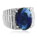 Anillo vintage de acero inoxidable con gran gema azul ovalada y banda texturizada - Talla EE. UU. 7 / Color Acero Gema Azul