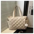 Beige quilted tote bag with diamond stitching and plush keychain for daily commute - Off-white with Pendant