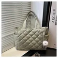 Sage green quilted tote bag with diamond stitching and cute plush charm detail - Green With Pendant