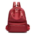 Sac à dos mode en nylon rouge foncé imperméable avec doubles bretelles et zips argentés - Rouge