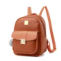 Brown woven PU leather backpack for women featuring gold metal lock and grey pompom charm - Brown