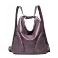 Purple faux leather backpack with studded zippers and versatile shoulder strap style - Purple