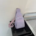 Minimalist light purple corduroy crossbody fanny pack with adjustable strap on white background - Purple