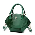 Borsa a mano verde scuro in pelle di coccodrillo con accessorio metallico a quadrifoglio - Medio / Verde
