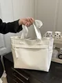 Minimalistische cremeweiße gewebte Tragetasche mit Reißverschlussfach und Seitenfach - Weiß