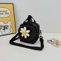 Small black sunflower canvas crossbody bag with 3D daisy and adjustable strap - Black
