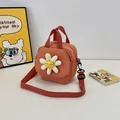 Orange canvas small crossbody bag with white daisy flower detail and adjustable strap - Red