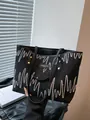 Black tote bag with colorful wave embroidery and star quilted texture detail - Black without Pendant