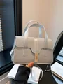 Elegante silberne Handtasche mit Strasssteinen und goldenem Drehverschluss für Damen - Silber