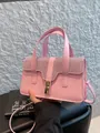 Rosa PU-Lederhandtasche mit funkelnden Strasssteinen und goldenem Drehverschluss - Rosa