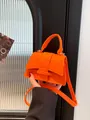 Orange felt mini square bag with quilted diamond stitching and gold metal hardware - Orange