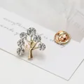 Detailed view of tree brooch with gold base and six sparkling round crystals - Rhinestone Tree