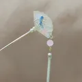 Detail of silver hair stick with blue fan-shaped flower pattern and pink beaded tassels - Fan Tassel