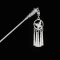 Macro shot of silver hair stick with hollow butterfly pendant and textured tassels - Butterfly Ring Tubular Tassel (Silver 6) / Silver