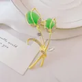 Elegant gold tulip brooch with green cat-eye stones and shimmering white crystals - Green Tulip (XZ42-004)