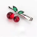 Elegant 3-piece set featuring red crystal cherry hair clips with green rhinestone leaves - Duckbill Hair Clips