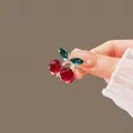 Deep red crystal cherry hair accessory set with emerald green leaves in gold finish - Mini Cherry Claw Clip