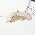 Elegant fan-shaped gold hair claw clip with pearlescent shell slices and white rhinestones - White Fan Hair Clip