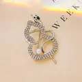 Silver snake brooch with green eyes and white pearl detail for a refined look - Silver 4