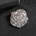 Macro shot of silver rose brooch featuring intricate layered petals and metallic finish - Rose / Silver