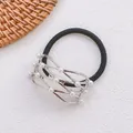 Élastique noir élégant avec fleurs en métal argenté et perles blanches fantaisie - Style ajouré ton argent avec perle artificielle (20 élastiques à cheveux)
