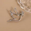 Minimalist silver hollow peace dove brooch with olive branch and black diamond eye detail - Silver