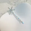 Macro detail of silver snowflake hair clip with sparkling rhinestones on heart tray - Medium Star Style (J009-01) / Silver