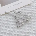 Fermaglio per capelli a cuore con fiamma d'argento e design metallico su tessuto - Argento Destro