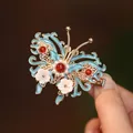 Elegant gold fan hair clip with blue wings and tassel for qipao hairstyling - Butterfly Pearl Style (F01-007) / Sky Blue
