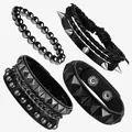 Close-up of four black punk bracelets with silver metal spikes, studs, and chain details - Rivets And Metal Chains Combination Set (21)
